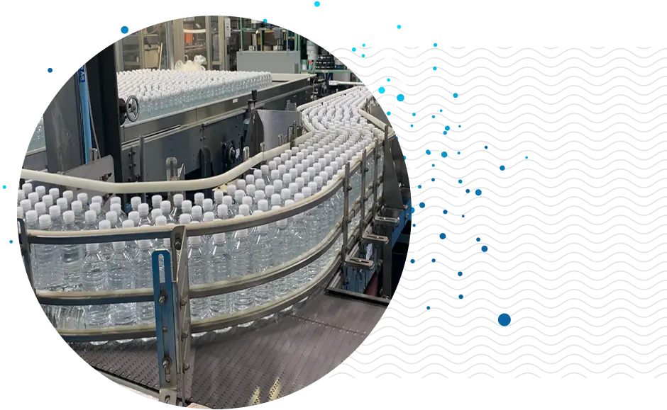 water bottles on a line at the DrinkMore Water bottling plant