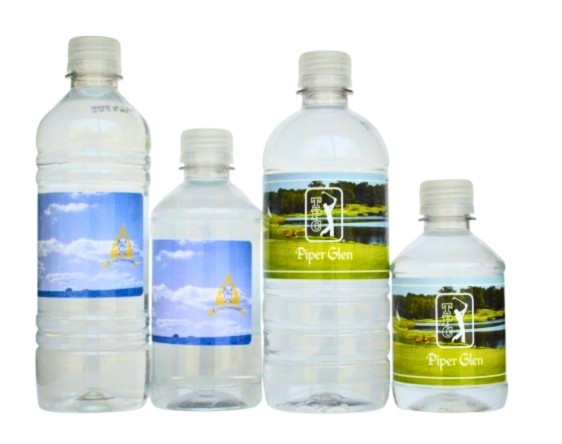 Custom labeled water for golf courses in four bottle sizes, with club logo and course photo labels