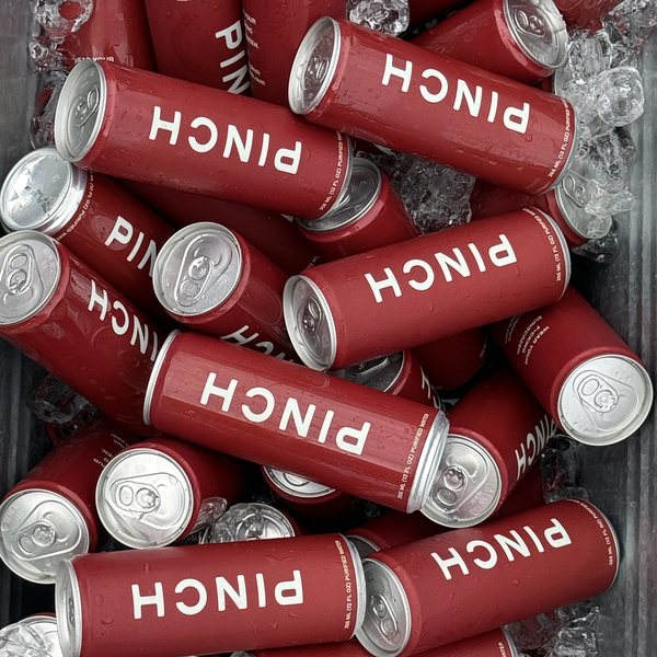 DrinkMore custom printed cans buried in ice with the printing perfectly intact
